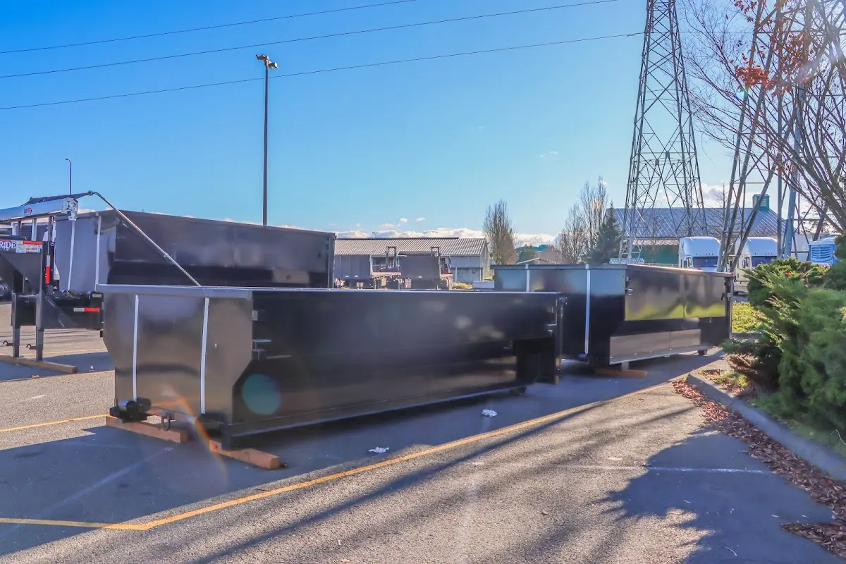 Roll-off dumpster ready for waste disposal at job site for 15 Yard Dumpster Rental in Emmett